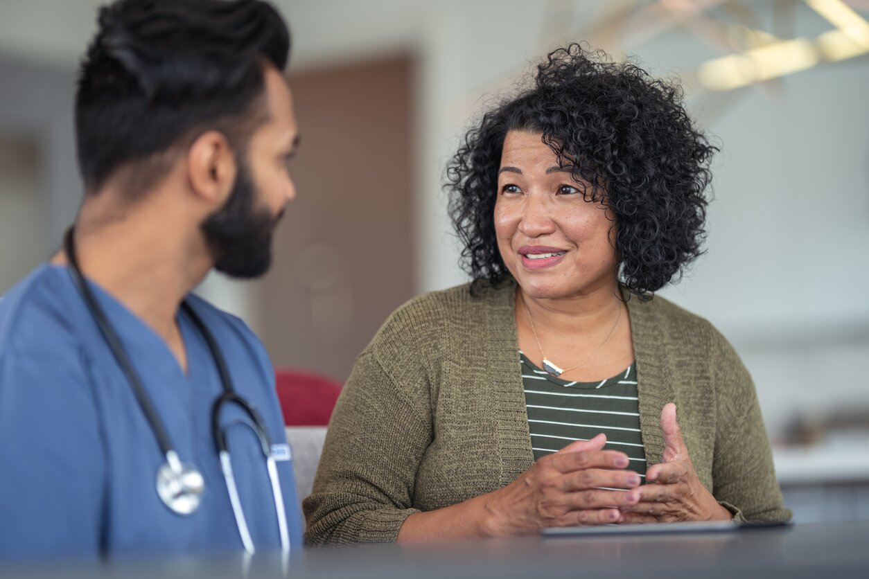 A study participant talking to a doctor